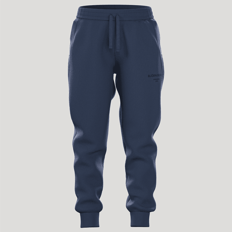 Dark blue joggers with an elastic waistband and drawstrings, featuring side pockets and cuffed hems, displayed on a plain background.