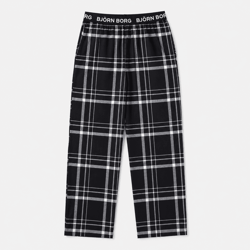 Plaid pajama pants with elastic logo waistband.