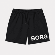 Kids' black sports shorts with elastic waistband, adjustable drawstring, side pockets, and large white logo print on the leg.