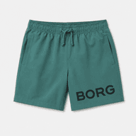 Green kids swim shorts with elastic drawstring waist and side pockets, shown flat on a light background.