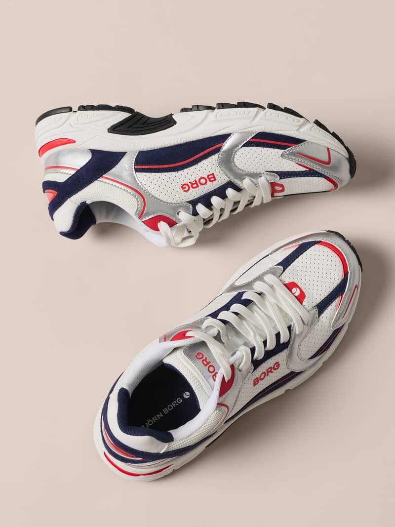 White, navy and red retro running sneakers shown from multiple angles.