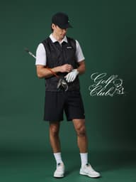 Man in a golf outfit holding a club, wearing a cap, vest, and shorts, stands against a green background with "Golf Club" logo.