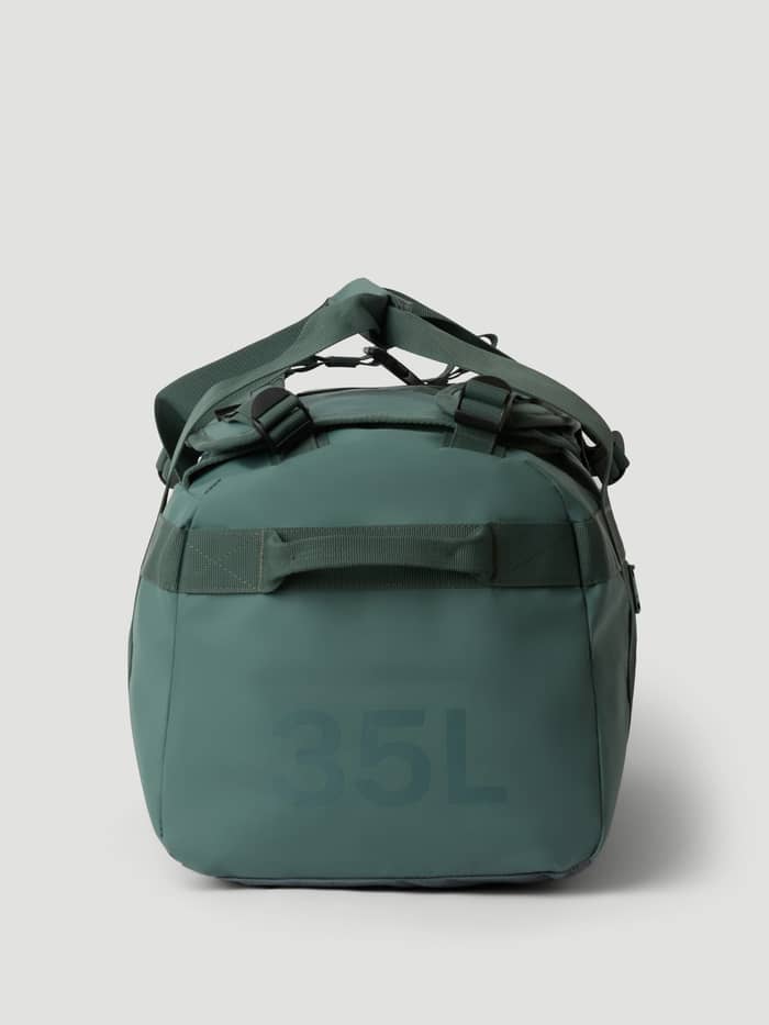 Side view of the Balsam Green (Green) Borg Duffle Bag 35L, highlighting its sturdy TPE coating and 35L side print. - Image 4