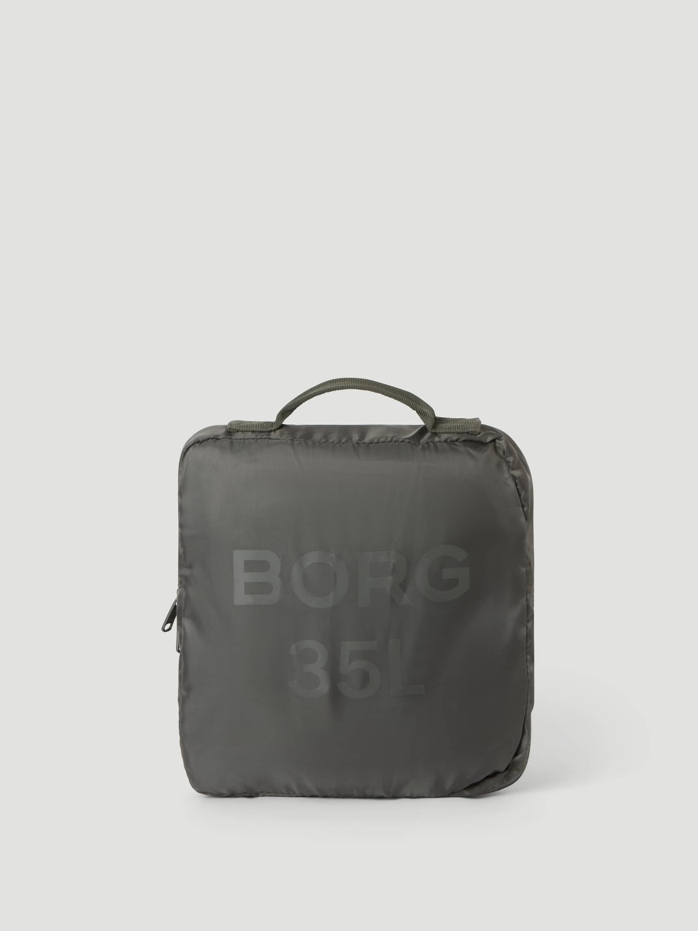 Folded Björn Borg Duffle Bag 35L in Forest Night (Green), featuring durable coated material and a sturdy carry handle. - Image 5