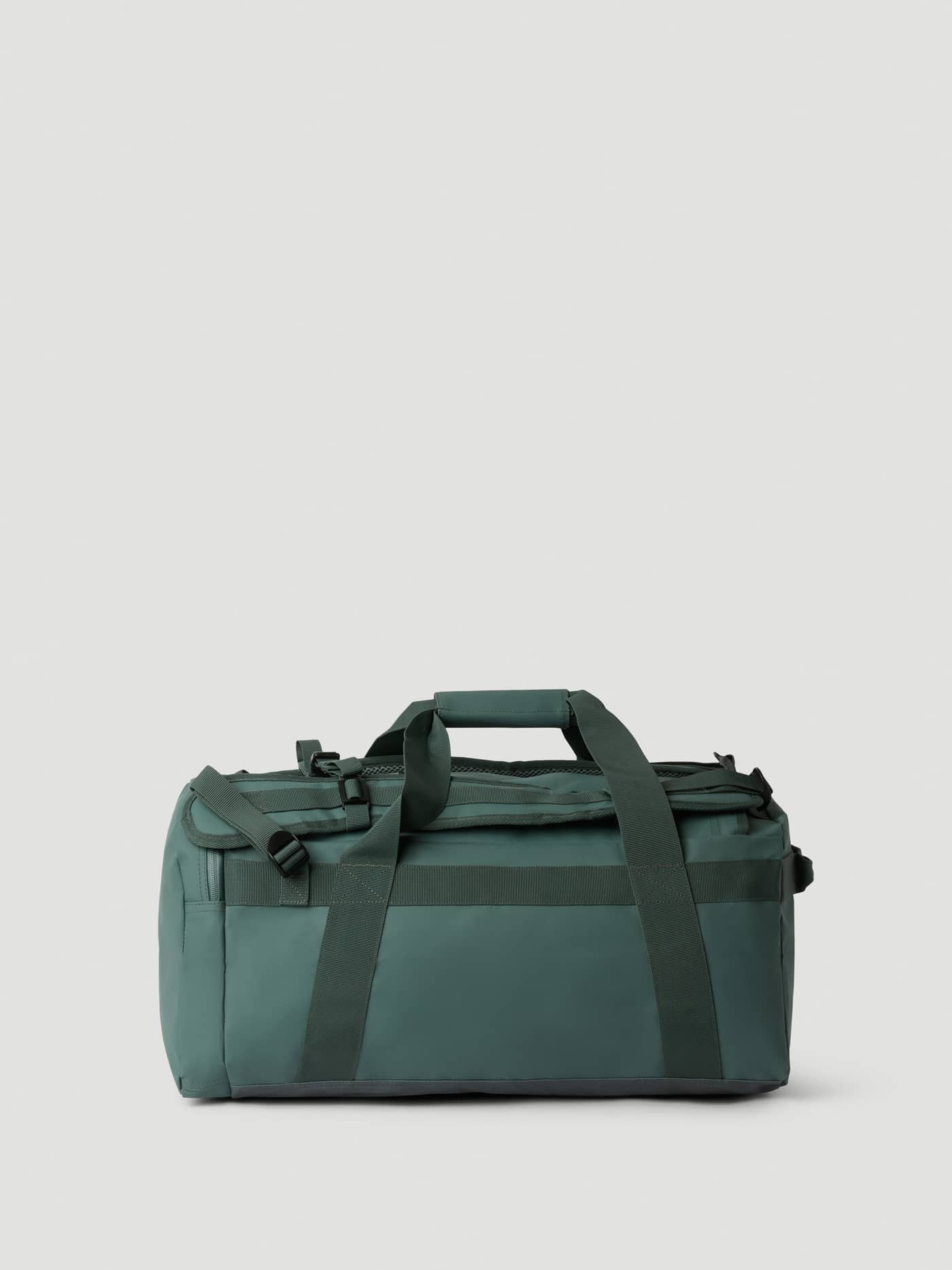 Side view of the sturdy Borg Duffle Bag 35L in Balsam Green (Green), featuring durable material for training. - Image 2