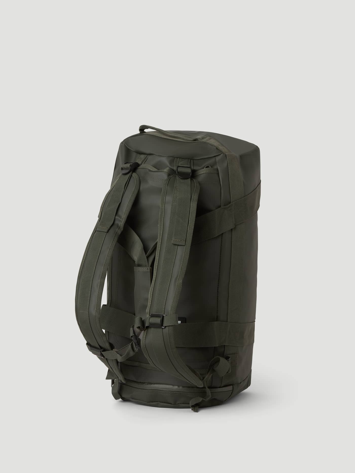 Borg Duffle Bag 35L in Forest Night (Green) featuring durable TPE-coated material and adjustable backpack straps. - Image 4