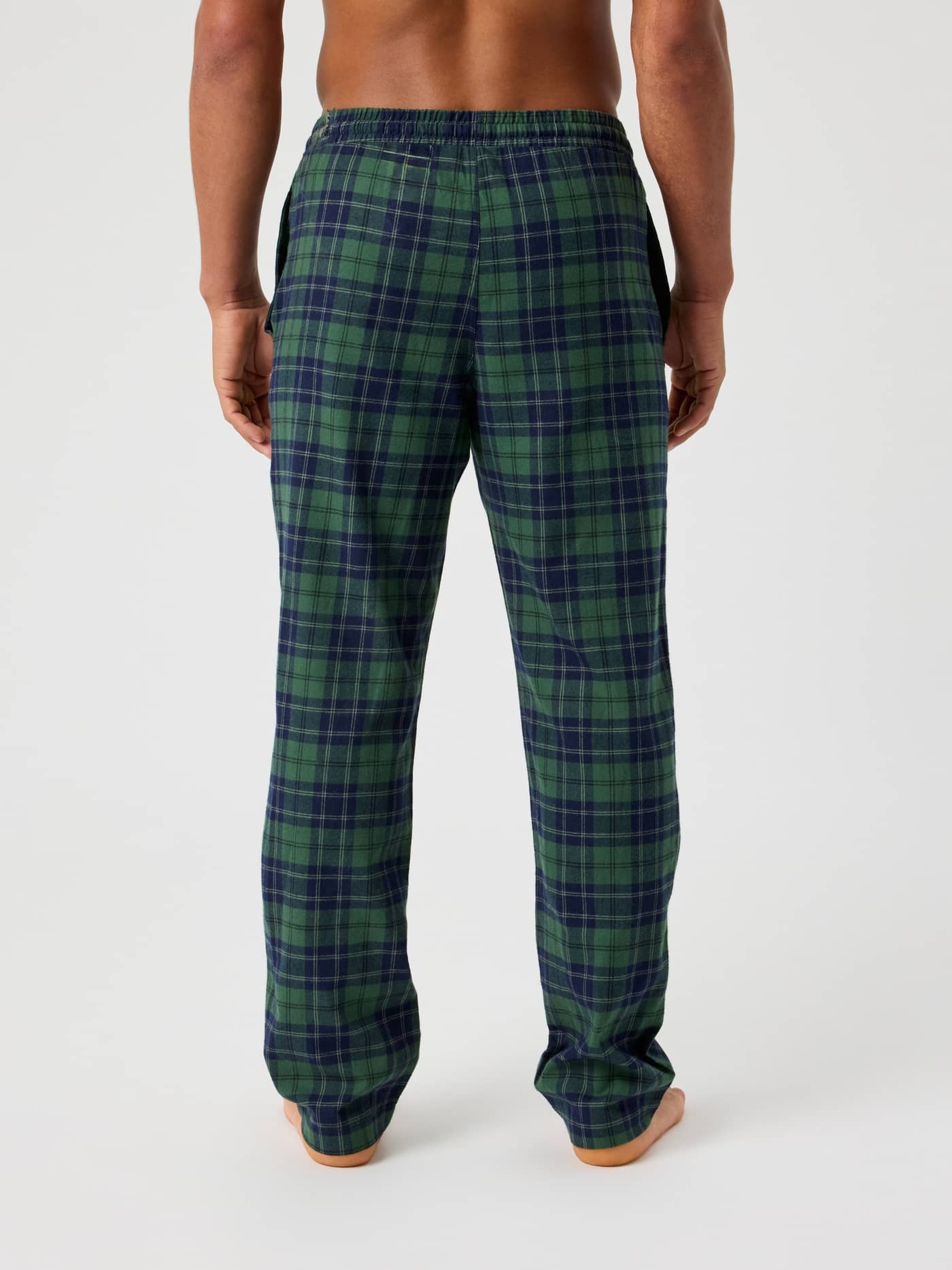 Back view of a man wearing Björn Borg Core Flannel Pyjama Pants in Forest Tartan 7 (Green) with a classic checkered print. - Image 2
