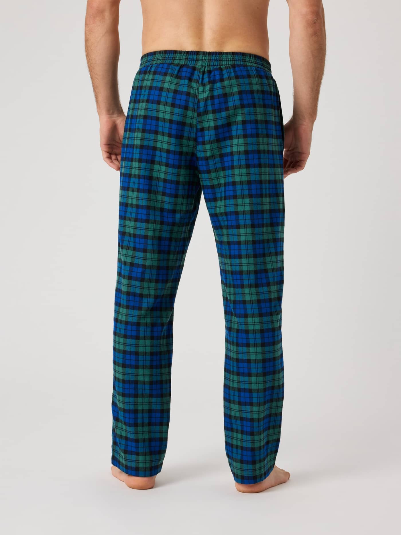 Back view of a man wearing Björn Borg Core Flannel Pyjama Pants in blue and green Hs Check 5 (Blue, Green) flannel checks. - Image 2