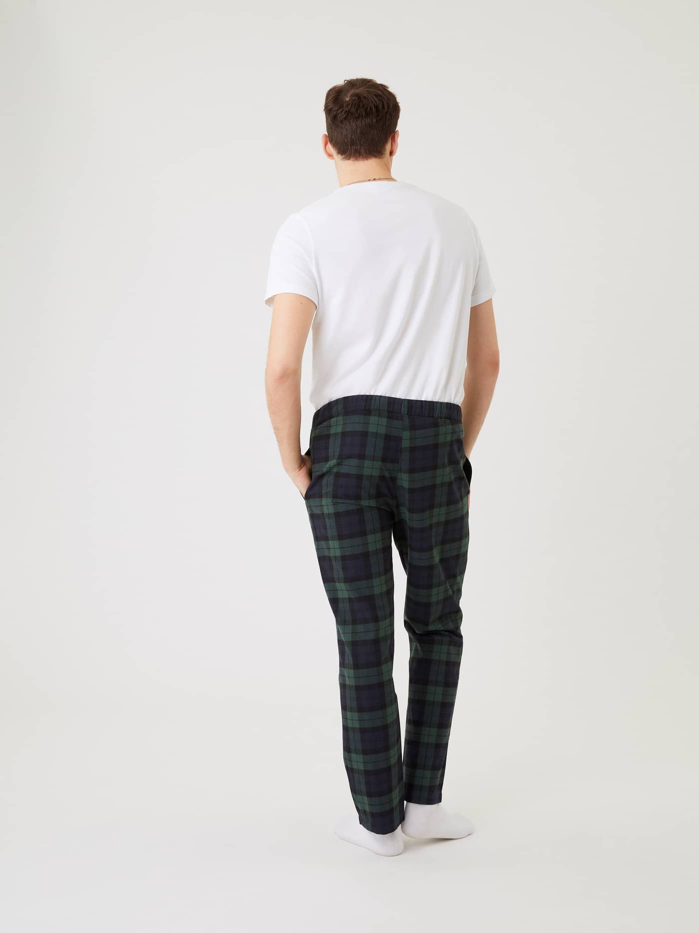 Man seen from behind wearing green and navy plaid Björn Borg Core Flannel Pyjama Pants with a white t-shirt. - Image 2