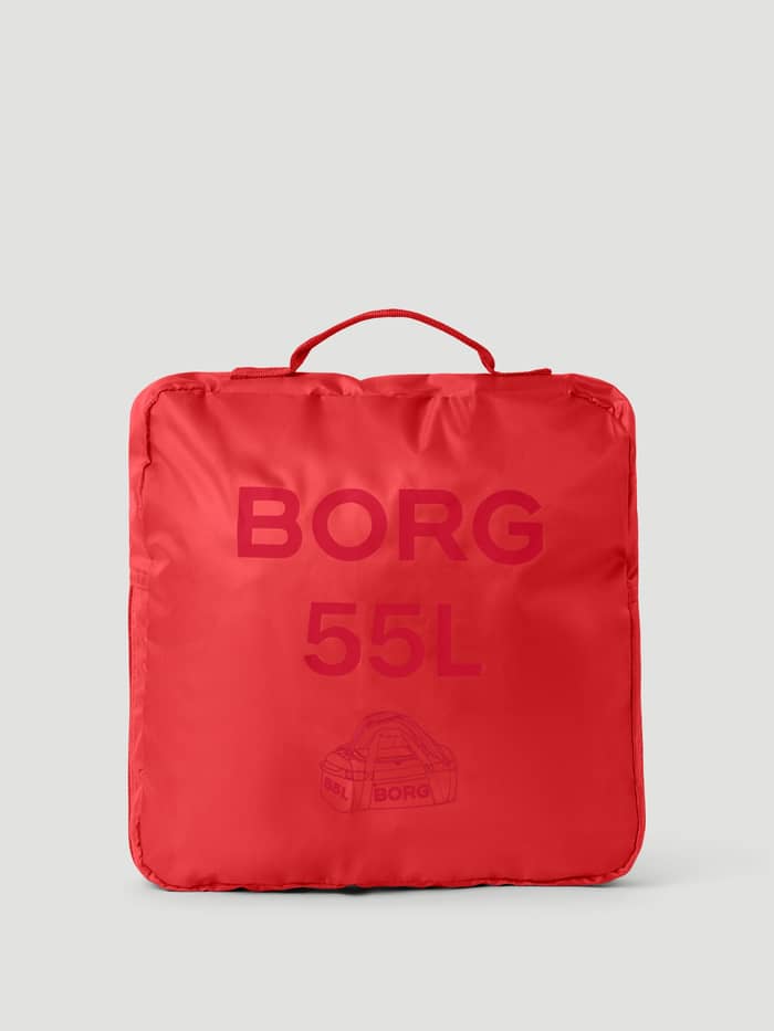 Borg Duffle Bag 55L in Samba (Red) folded into its compact training storage pouch made of durable TPE material. - Image 3