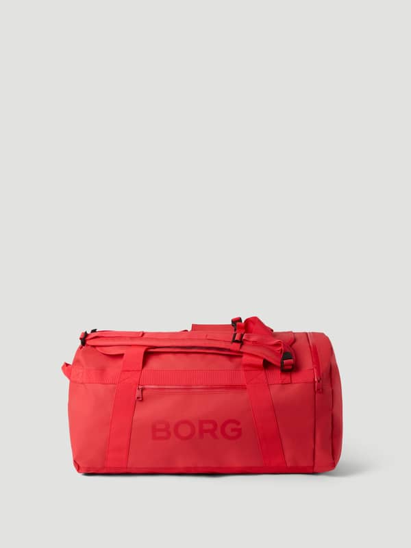 Samba (Röd) Borg Duffle Bag 55L sedd framifrån i tåligt, belagt material med stor logotyp för träning.