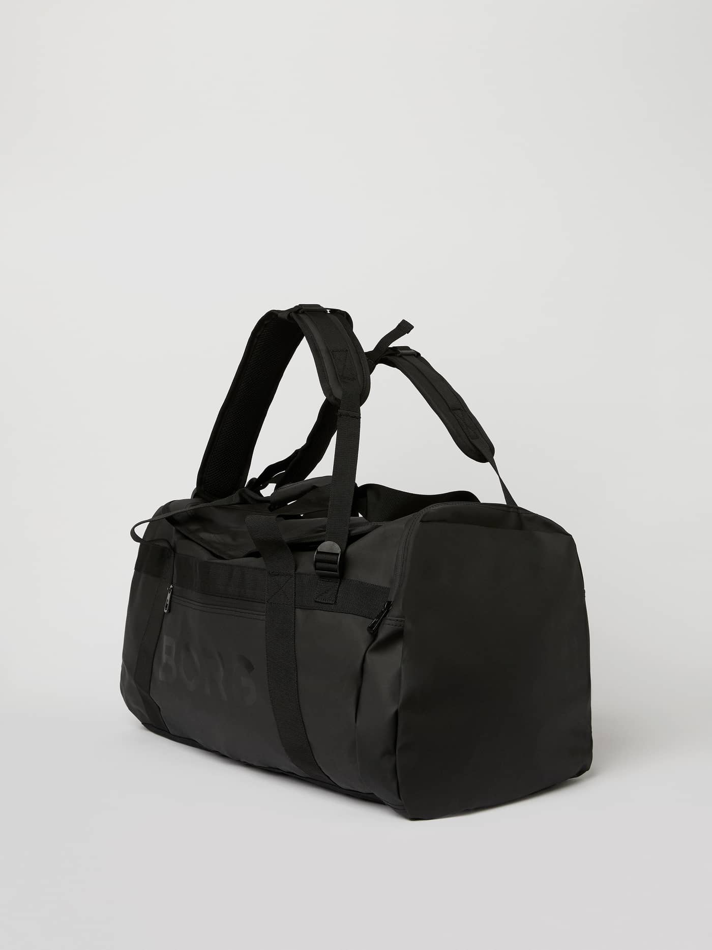 Side view of the black Borg Duffle Bag 55L, featuring a tonal logo and functional adjustable straps for training. - Image 4