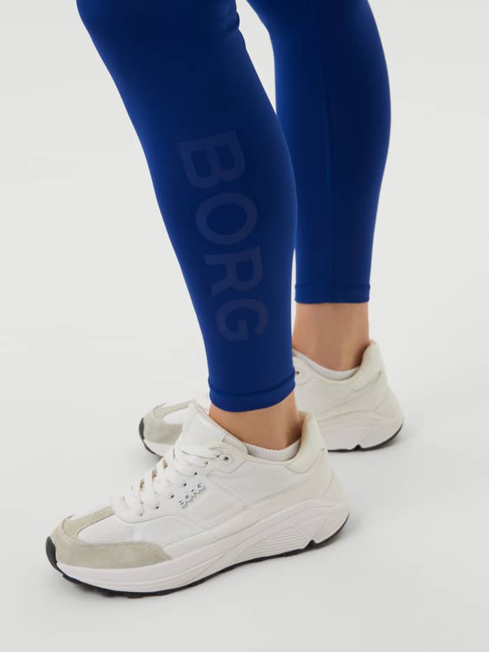 Detailed view of stylish training Björn Borg Logo Tights in Sodalite Blue (Blue) with a dark blue logo print. - Image 5