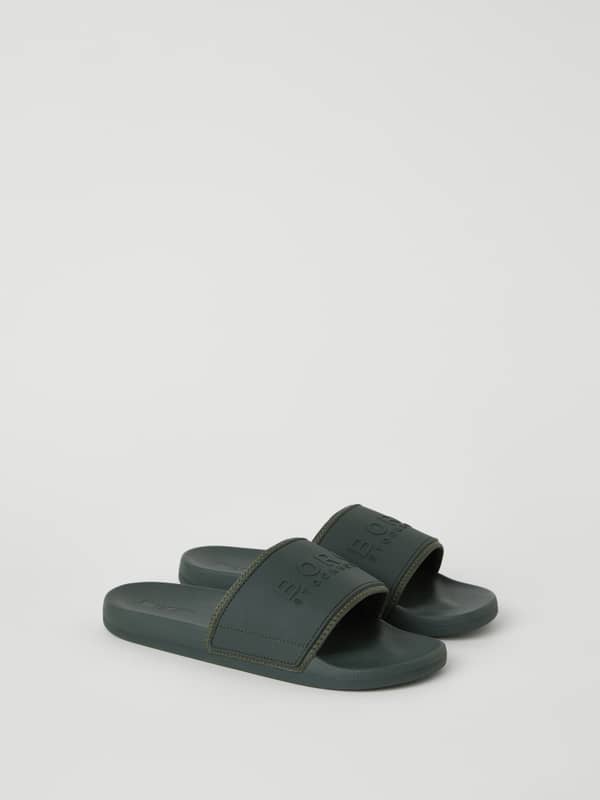 Men's Sandal Romeo Sthlm Logo in Green featuring a tonal branded TPU strap and a soft EVA foam outsole.