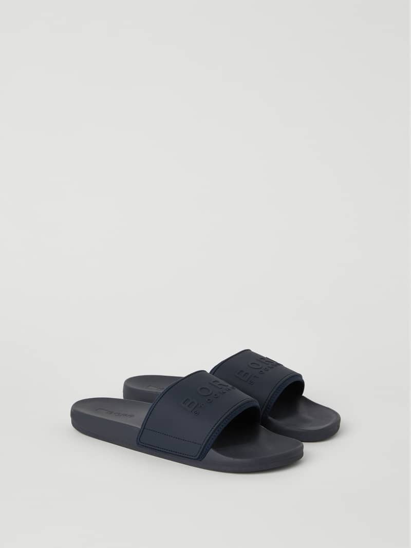 Men’s Sandal Romeo Logo in navy, featuring a tonal embossed TPU rubber strap and a comfortable EVA foam outsole. - Image 1