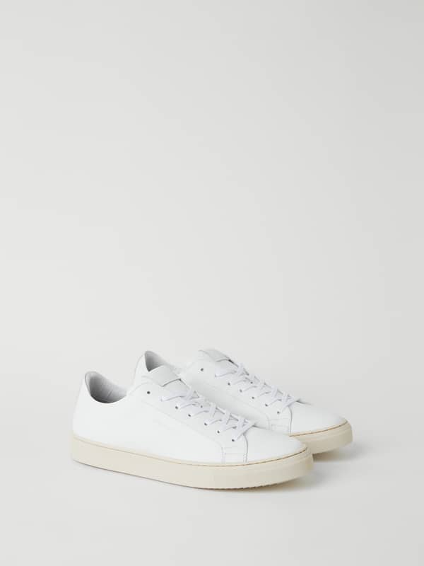 Men's Leather Sneaker Sl100 i vitt läder med en minimalistisk skandinavisk design och greppvänlig gummisula.