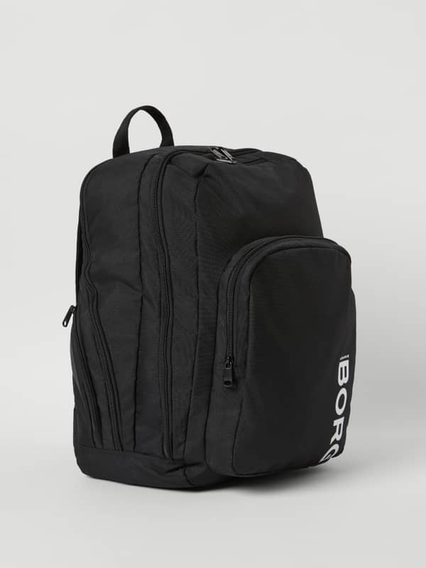 Front side view of the black Björn Borg Core Curve Backpack 27L with a white BORG logo.