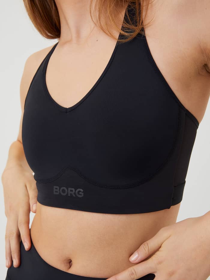 Nahaufnahme des Borg Mid V Support in Black Beauty (Schwarz) für Training mit schwarzem Logo und stilvollem Fit. - Image 4