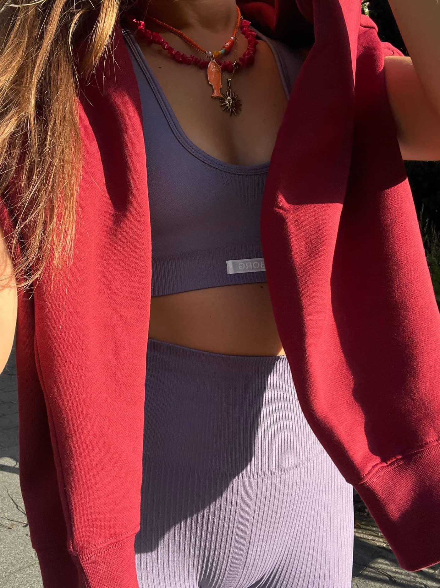Björn Borg Studio Low Seamless Bra in Purple Sage (Purple), showcasing a seamless training fit and white logo label. - Image 2