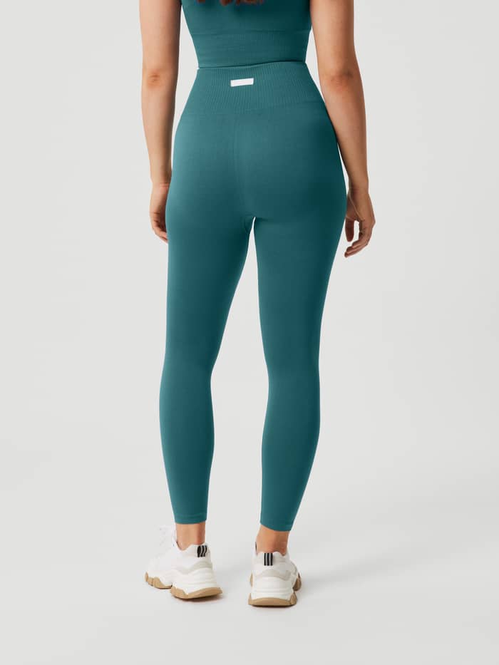 Back view of Mallard Blue (Blue) Studio Seamless Light Tights for training, featuring a seamless, high-waisted fit. - Image 4