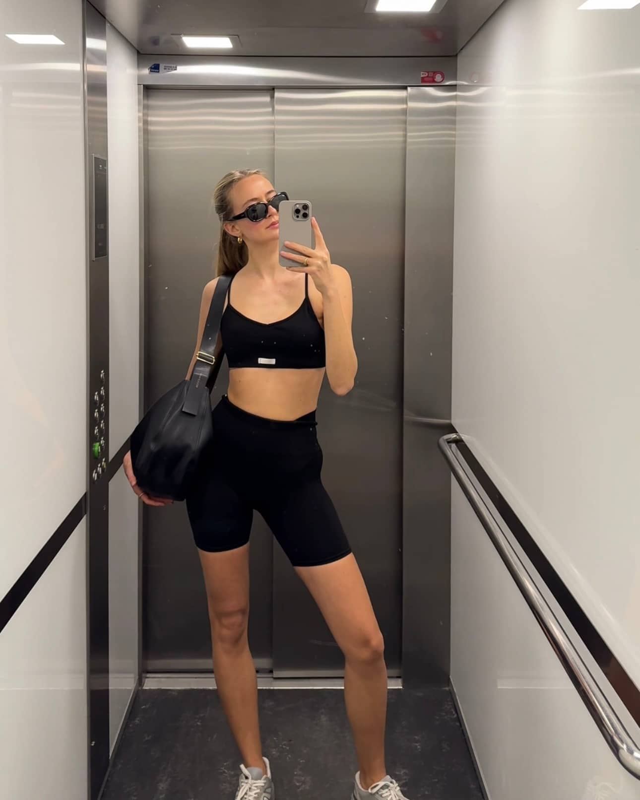 Full-body selfie of a woman wearing the high-waist Studio Seamless Rib Shorts in Black Beauty (Black) for training. - Image 3
