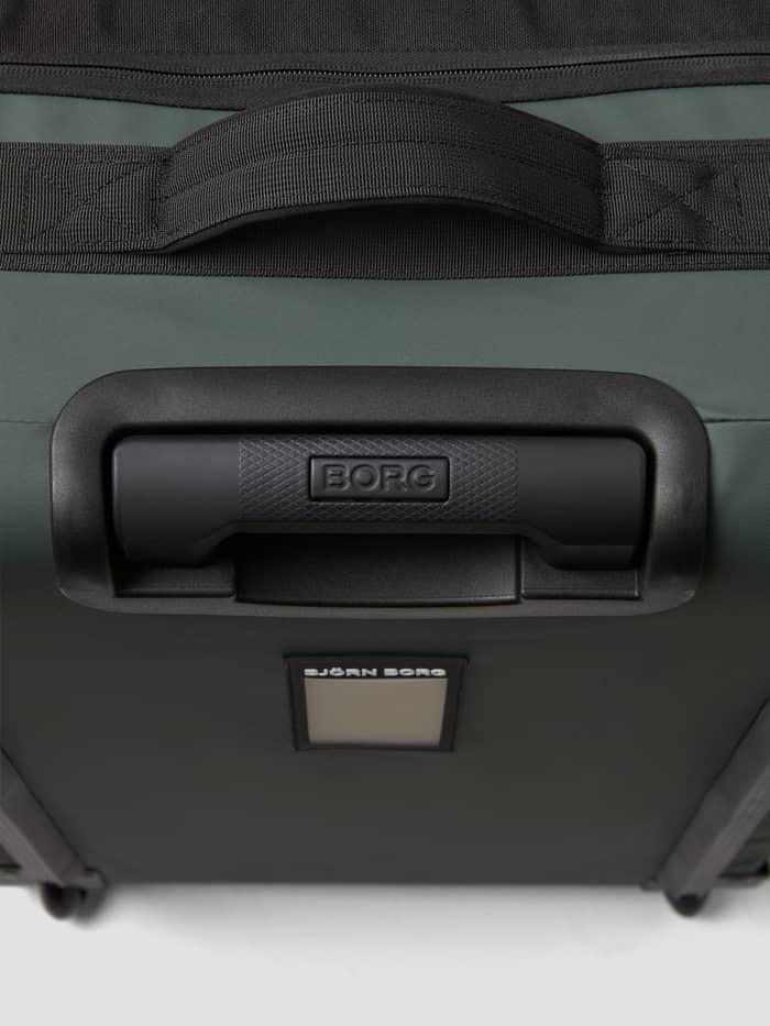 Borg Travel Trolley L - 80L in MOUNTAIN VIEW (Groen) met zwarte BORG-logo handgreep en stevige handriem in close-up. - Image 5