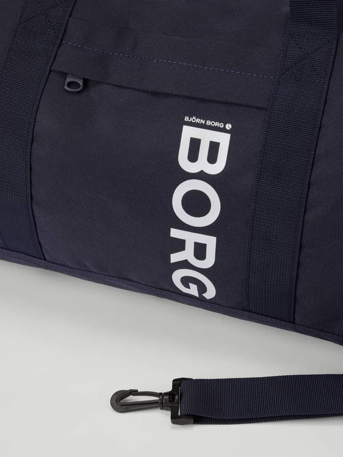 Core Sports Bag 31L träningsväska i Night Sky (Marinblå) med vit Borg-logotyp och dragkedjeficka. - Image 3