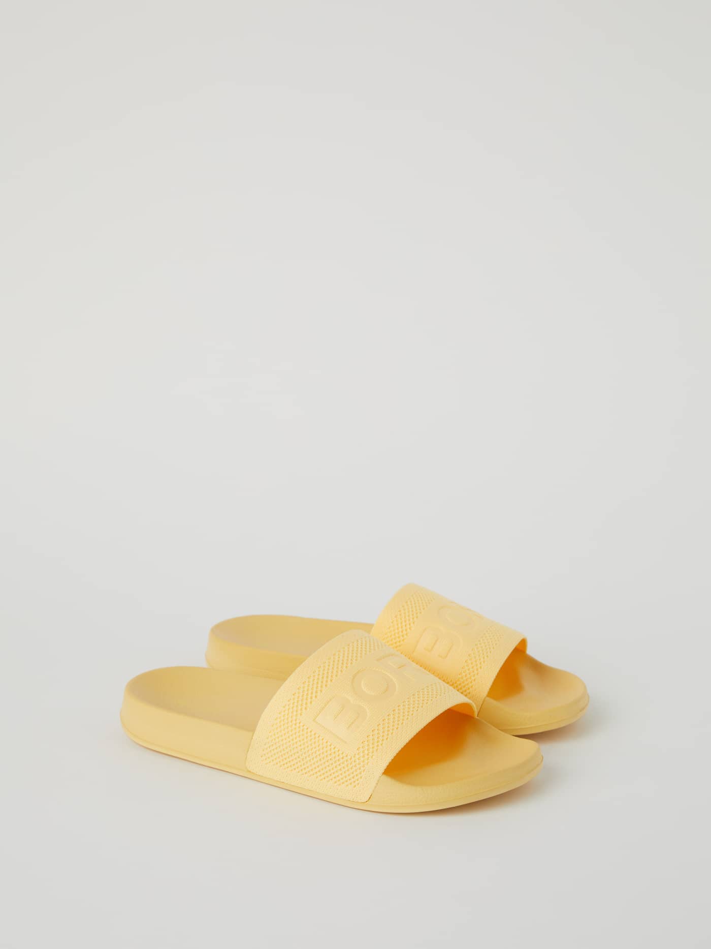 Front view of the stylish yellow Björn Borg Women's Sandals Knox Knit featuring a tonal logo and a comfortable fit. - Image 1