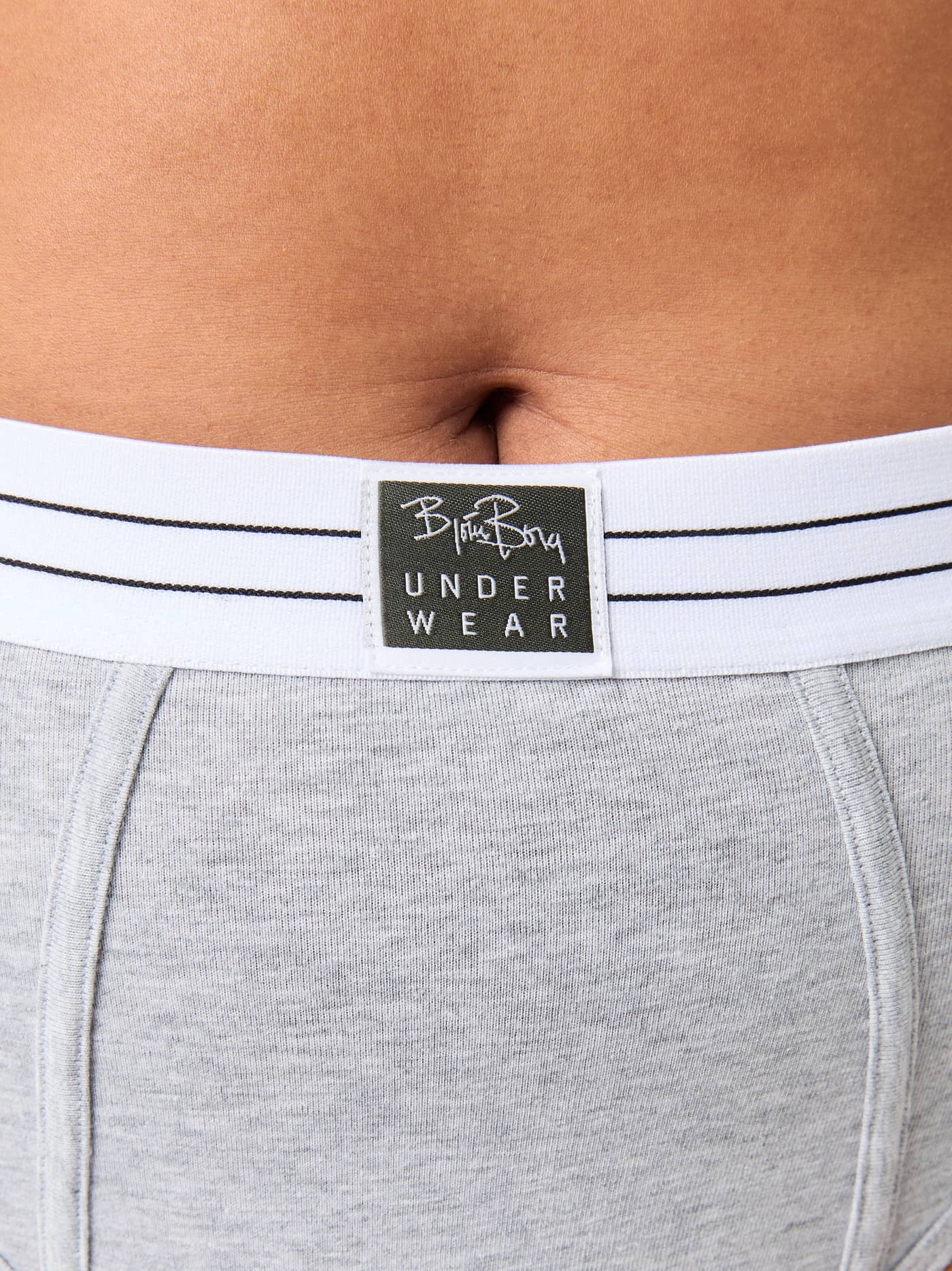 Detailed close-up of the grey Core Original High Waist Brief 2-pack featuring the heritage-inspired waistband and label. - Image 8