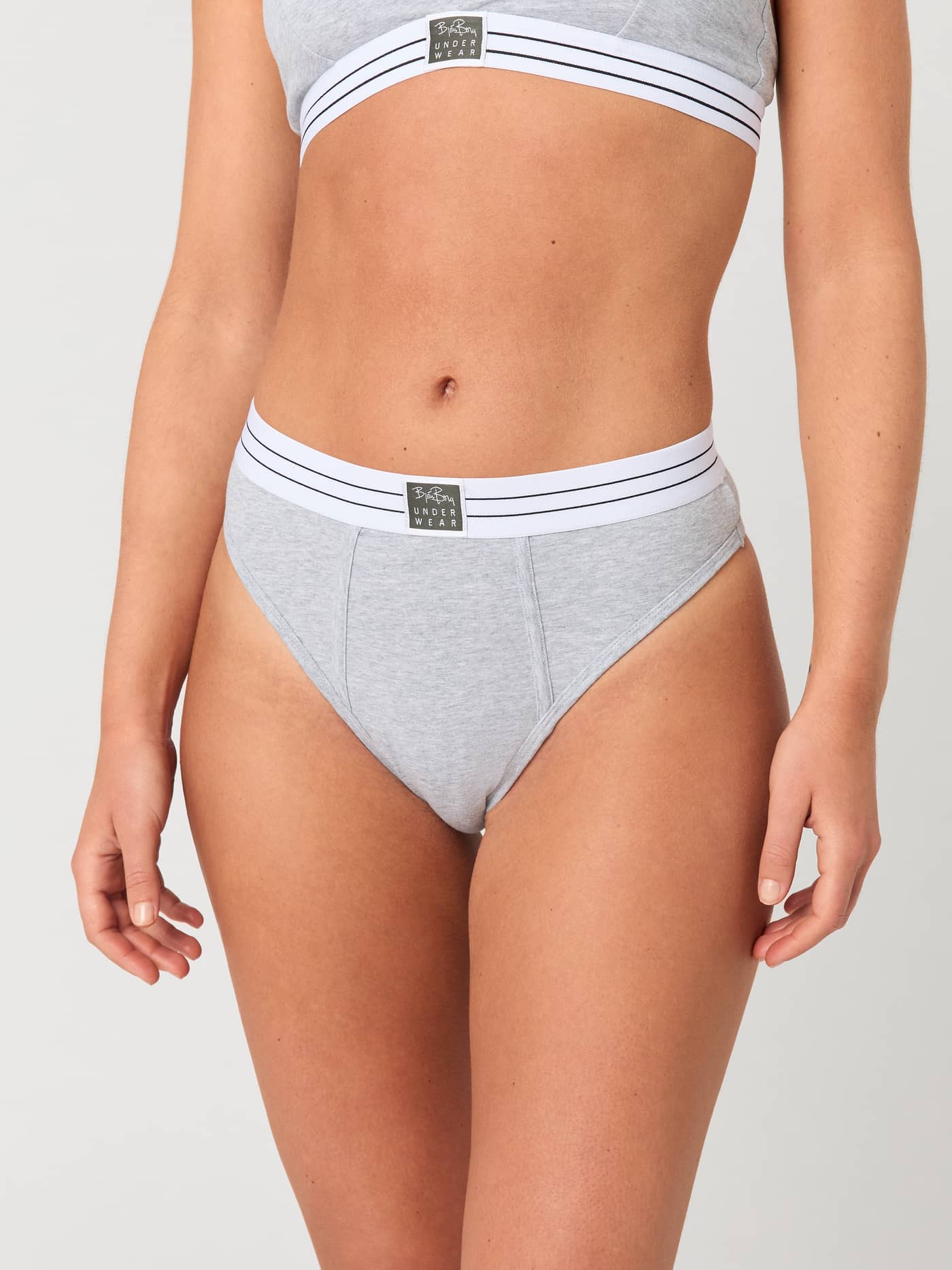 Front view of a woman wearing the grey Core Original High Waist Brief 2-pack with a soft, high-waisted fit. - Image 1