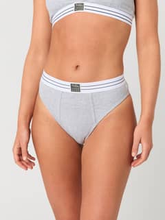 Front view of a woman wearing the grey Core Original High Waist Brief 2-pack with a soft, high-waisted fit. - Image 1