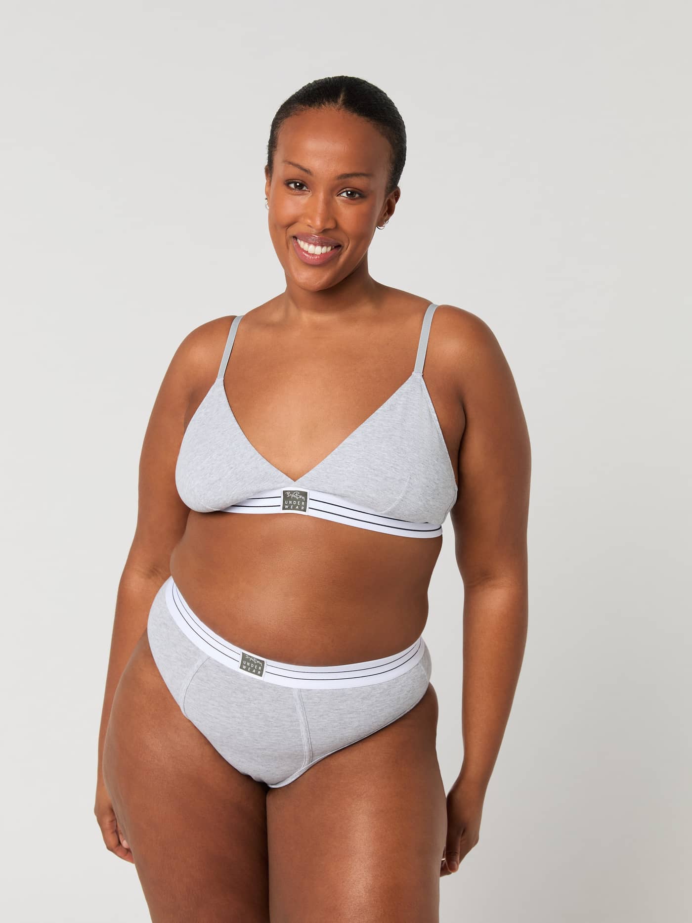 Front view of a model wearing the grey Core Original High Waist Brief 2-pack, featuring a high-leg fit and soft cotton. - Image 9