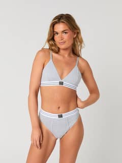 Front view of a model wearing the grey Björn Borg Core Original High Waist Brief 2-pack with a black heritage logo label. - Image 3
