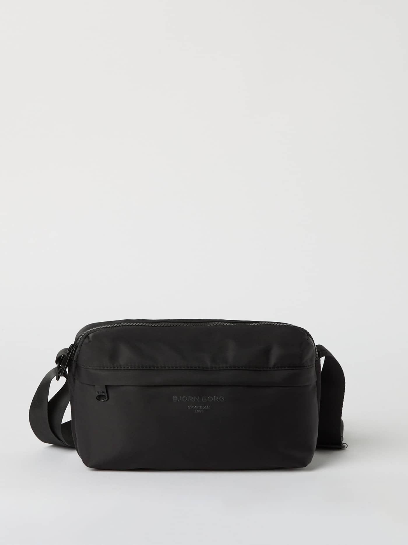 Front view of the stylish Borg Daily Crossover Bag in Black Beauty (Black), with a solid finish and functional strap. - Image 1