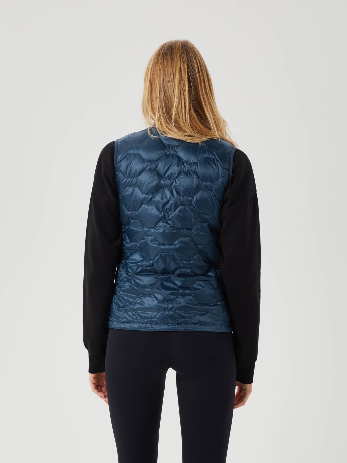 Vue de dos du Borg Down Liner Vest matelassé en Midnight Navy (Bleu marine) pour une coupe élégante. - Image 3