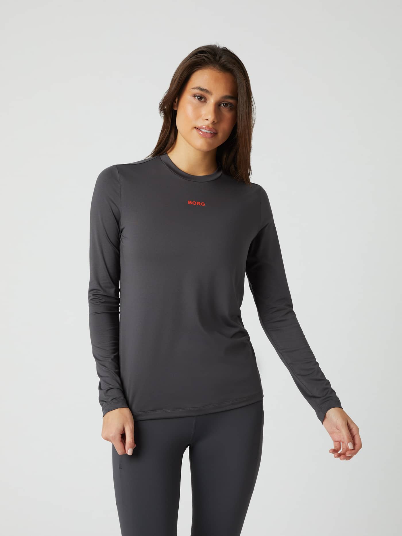 Front view of a model wearing the Borg Long Sleeve T-shirt in asphalt grey. - Image 1