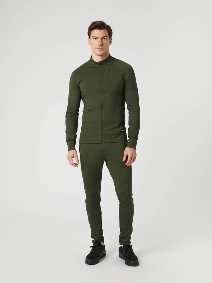 Full-body front view of a man wearing the Borg Training Midlayer Jacket in Duffel Bag (Green) for a functional stretch fit. - Image 3