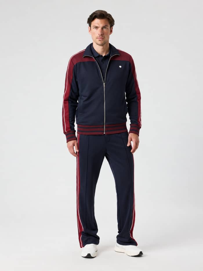 Front view of a male model wearing the Ace Retro Track Jacket in Night sky (Navy) for tennis.