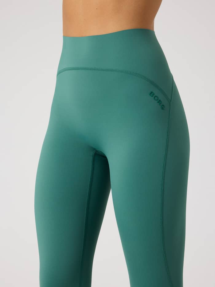 Seitenansicht der Borg Sleek Tights in Mallard Green (Grün) mit hoher Taille, schmalem Fit und grünem Logo für Training. - Image 5