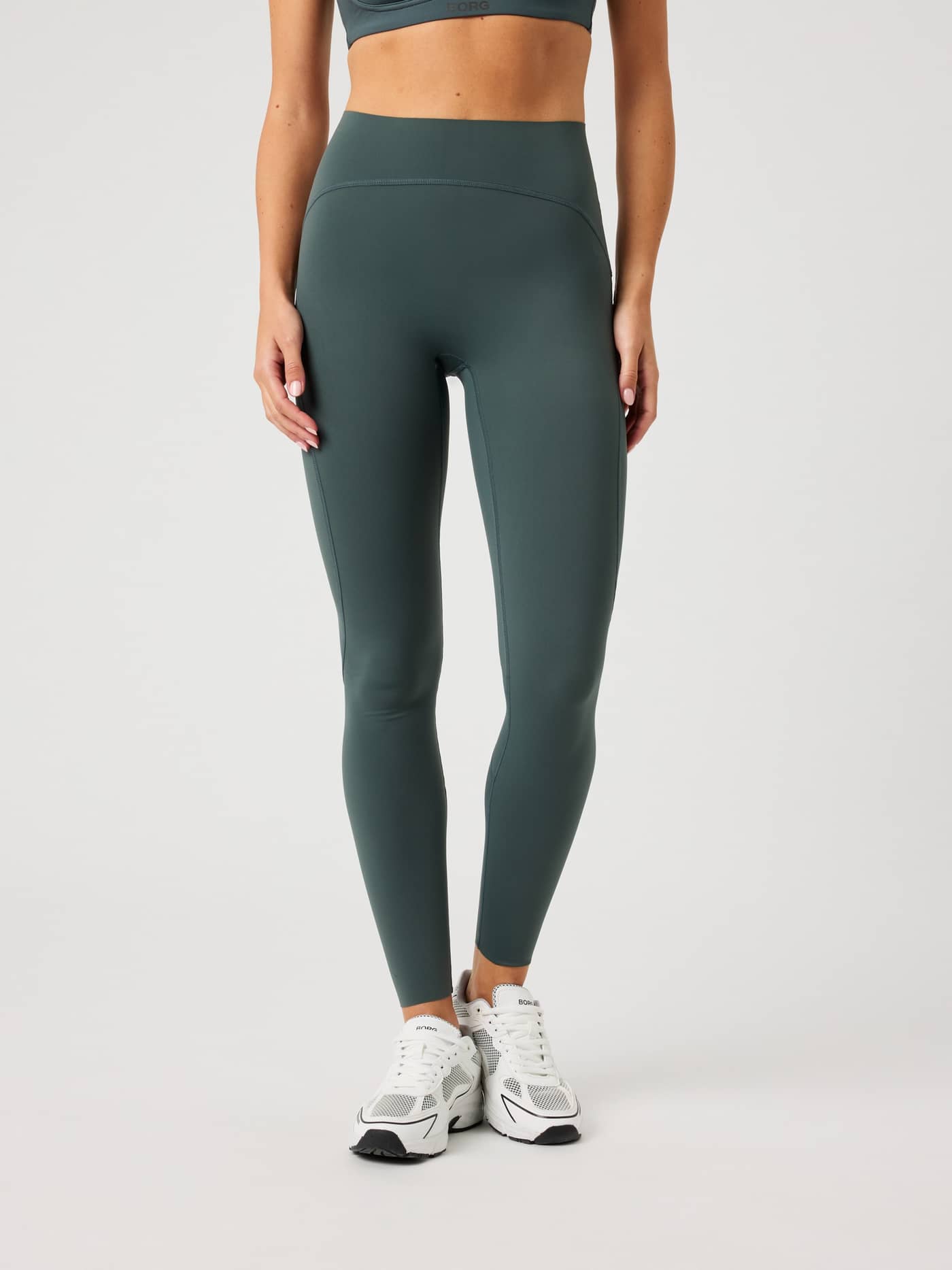 Borg Sleek Tights in Urban Chic (Groen) met een hoge taille en slanke pasvorm voor training, getoond in vooraanzicht. - Image 1