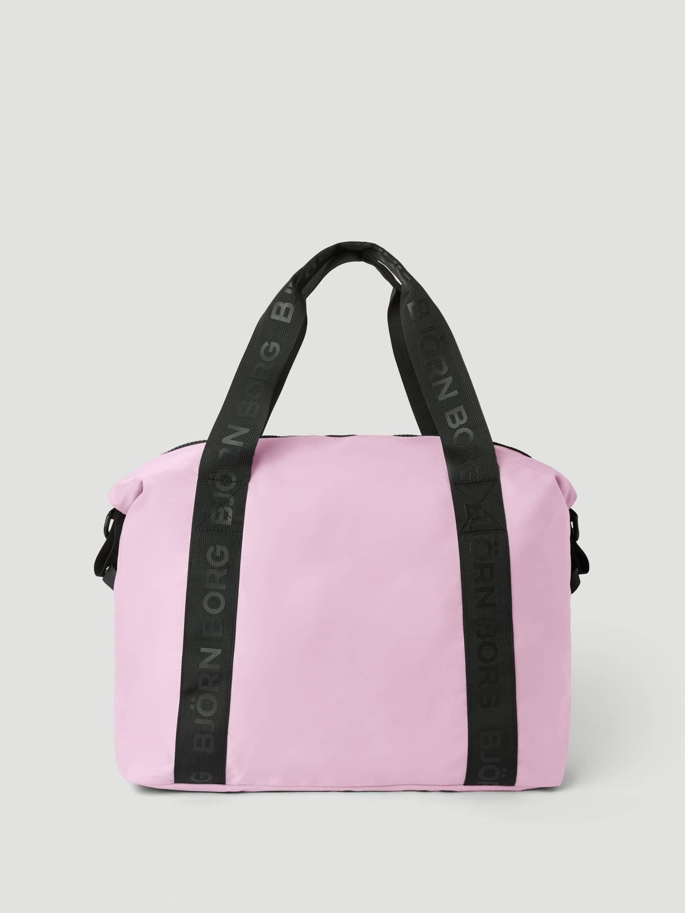 Borg Classic Sports Bag 28L in Pink Lady (Pink) with black branded webbing handles for versatile training use. - Image 2