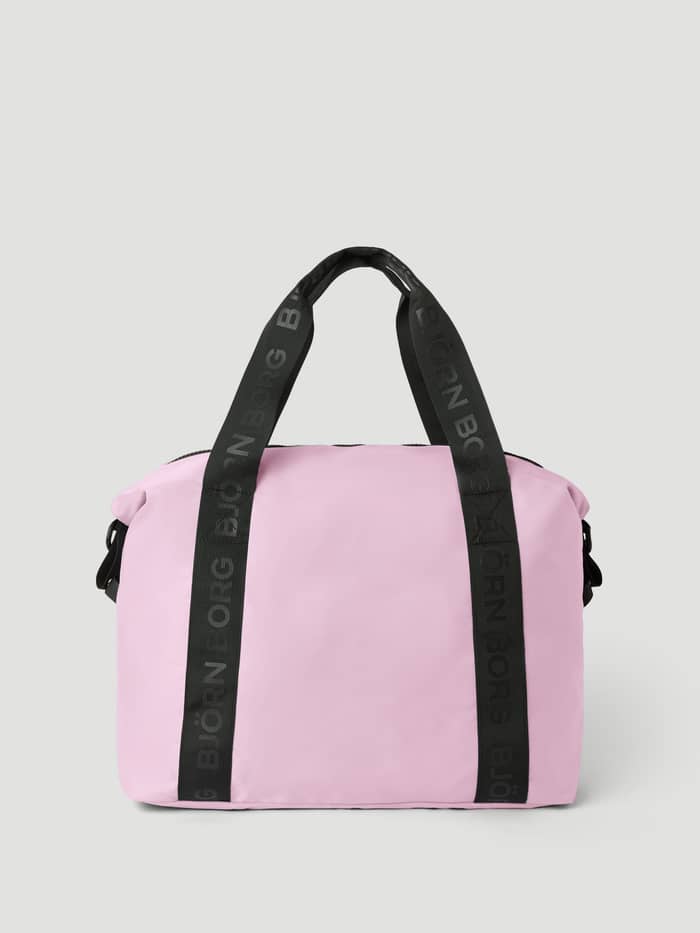 Vue de face du Borg Classic Sports Bag 28L en Pink Lady (Rose) avec poignées logotypées noires pour l'entraînement. - Image 2