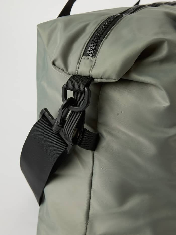 Agave Green (Green) Borg Classic Sports Bag 28L featuring a black detachable shoulder strap and zipper for training.