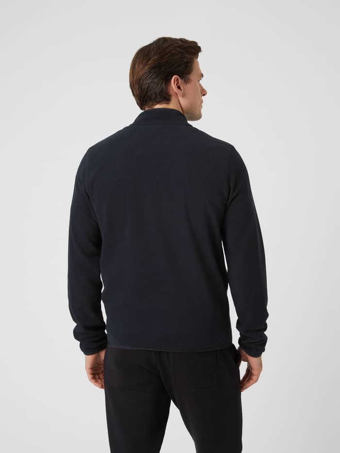Back view of a man wearing the black Borg Full Zip Fleece jacket. - Image 3