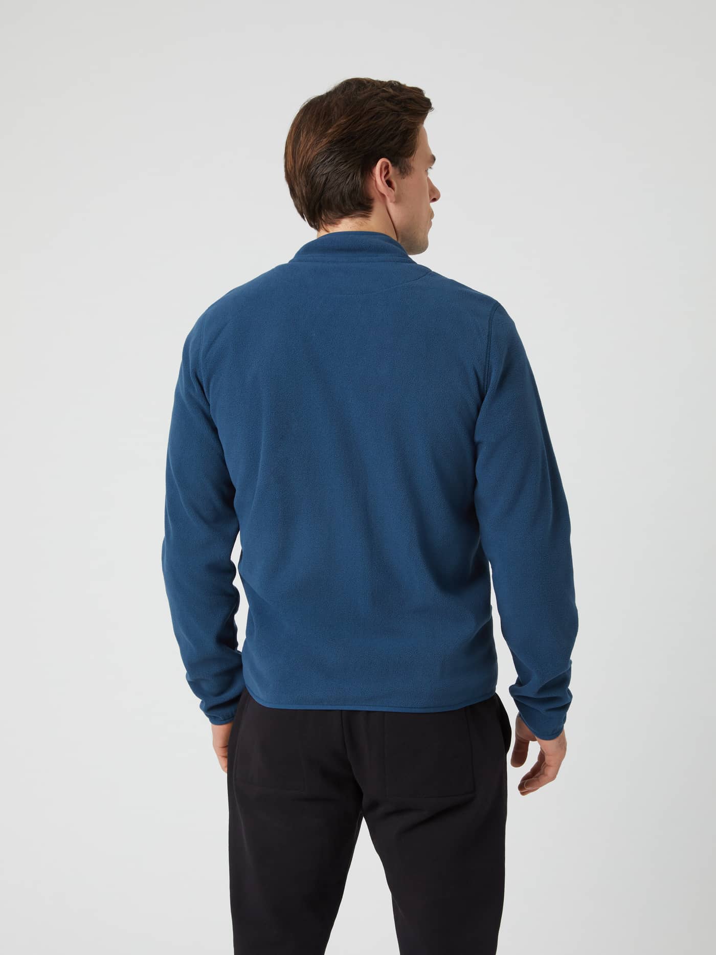Back view of model wearing the Björn Borg Borg Full Zip Fleece in Blue Wing Teal. - Image 2