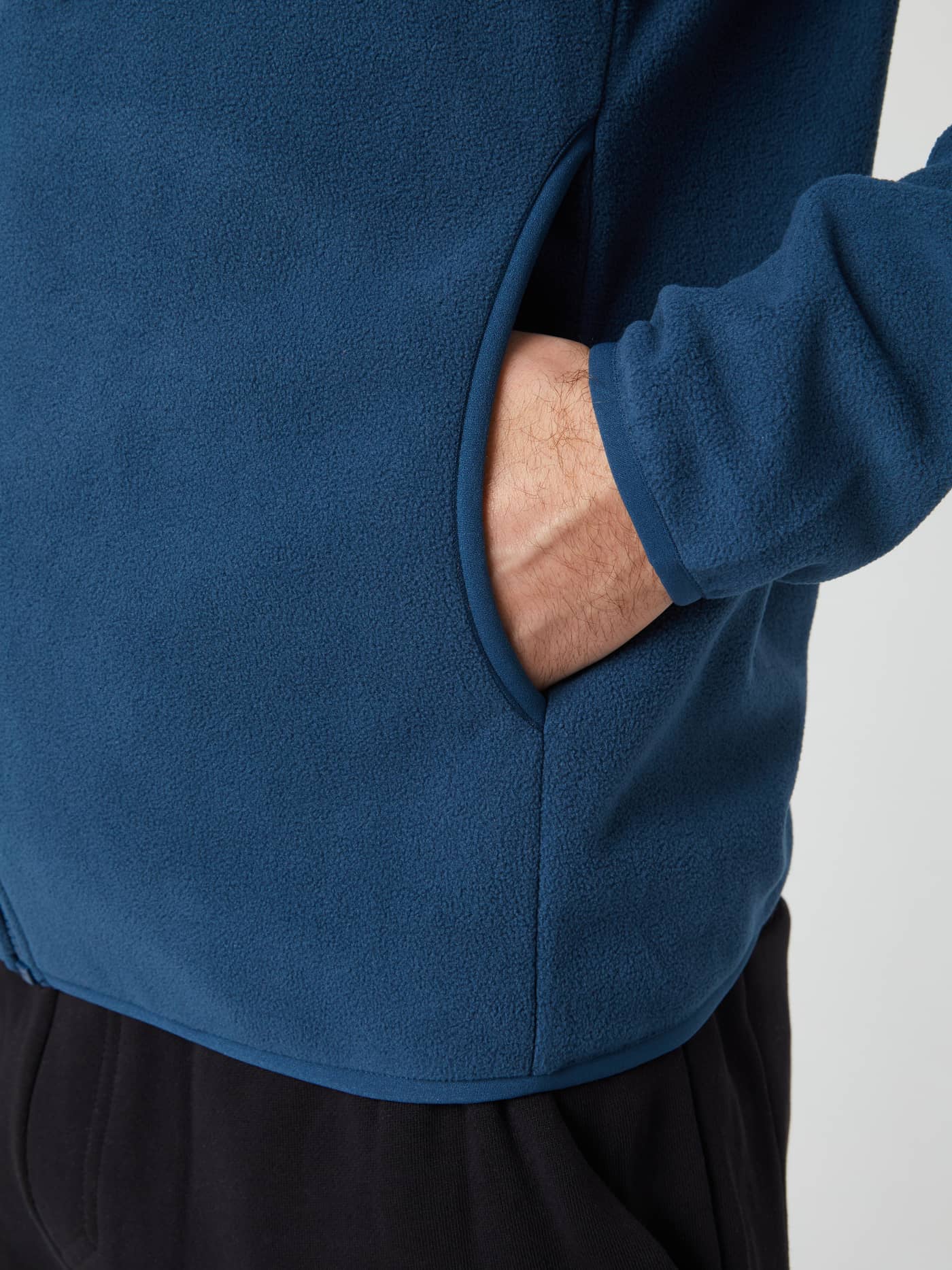 Close-up of the side pocket on the Borg Full Zip Fleece in Blue Wing Teal. - Image 5