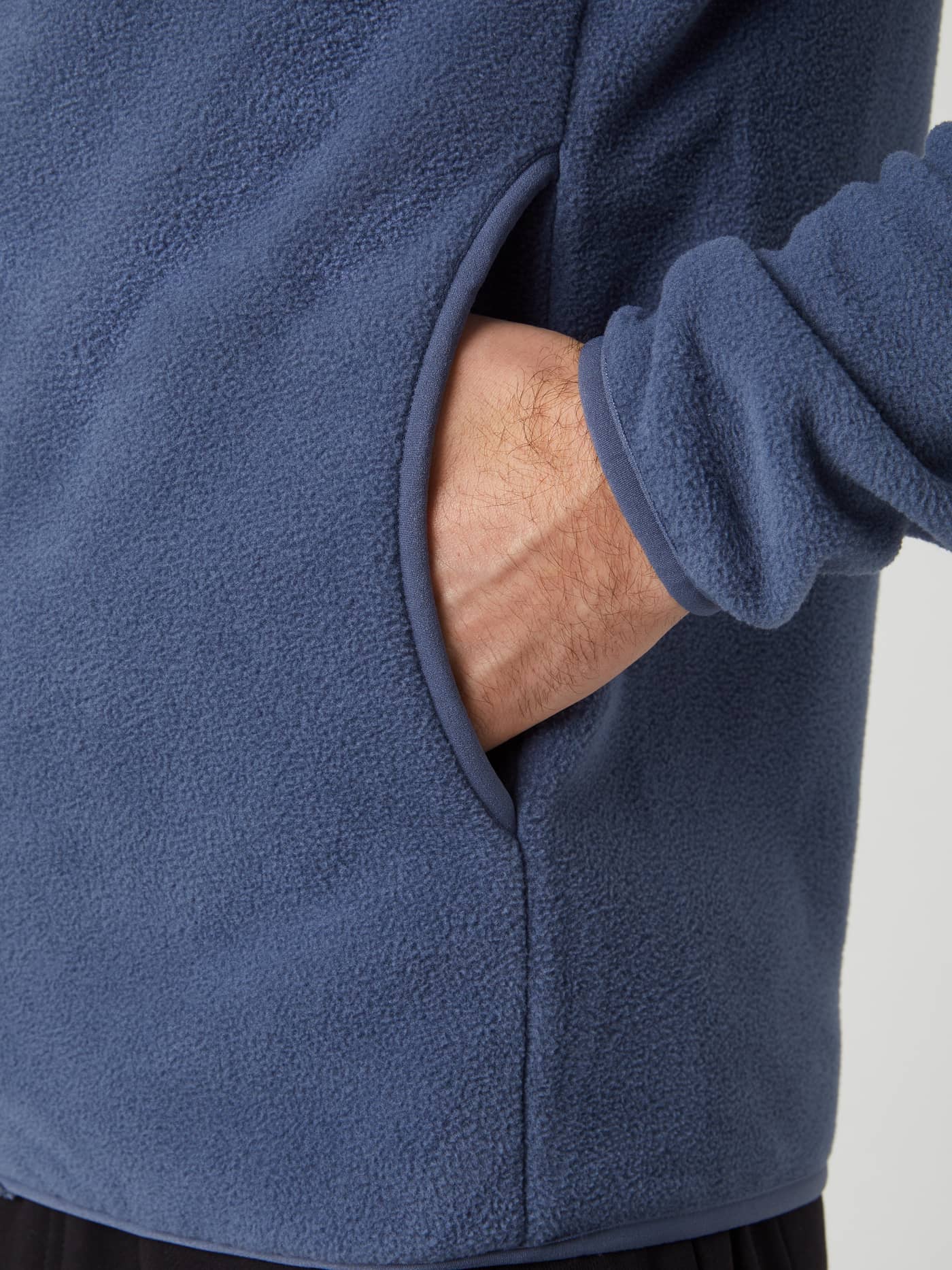 Detail shot of the hand pocket on the men's Borg Full Zip Fleece in Nightshadow Blue. - Image 5