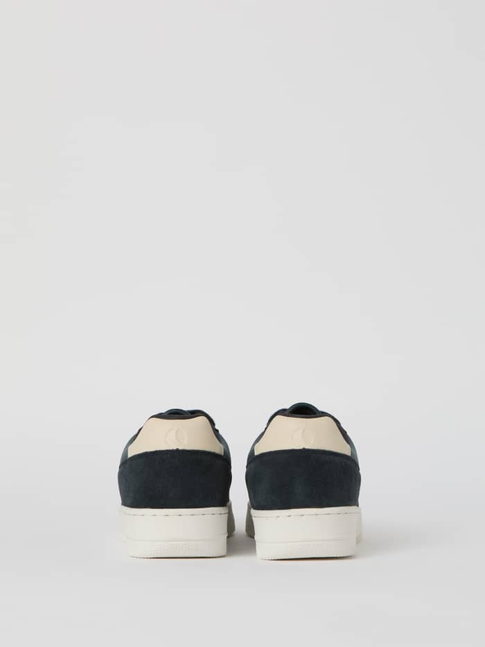 Back view of the Men's Line Sneakers in navy, featuring a functional suede and synthetic leather mix and a tonal heel logo. - Image 2