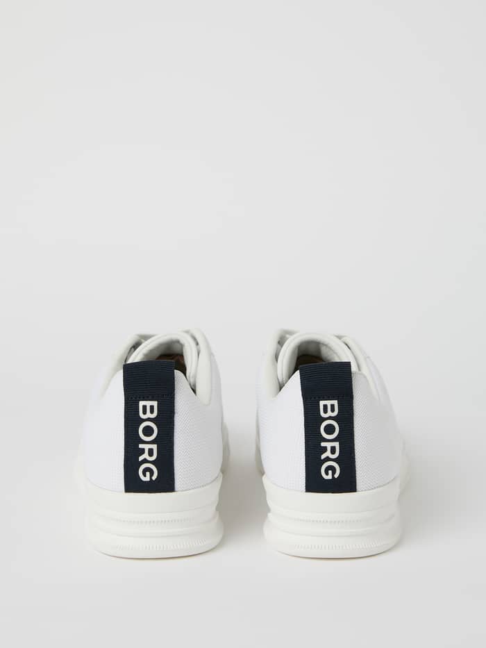 Back view of the white Men’s Sneakers T2600, a tennis style with white BORG logos on navy heel tabs and breathable mesh. - Image 3
