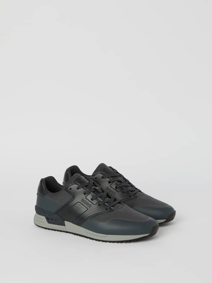Men's Match Sneakers in navy, featuring breathable mesh, synthetic leather, and a dark logo for running performance.